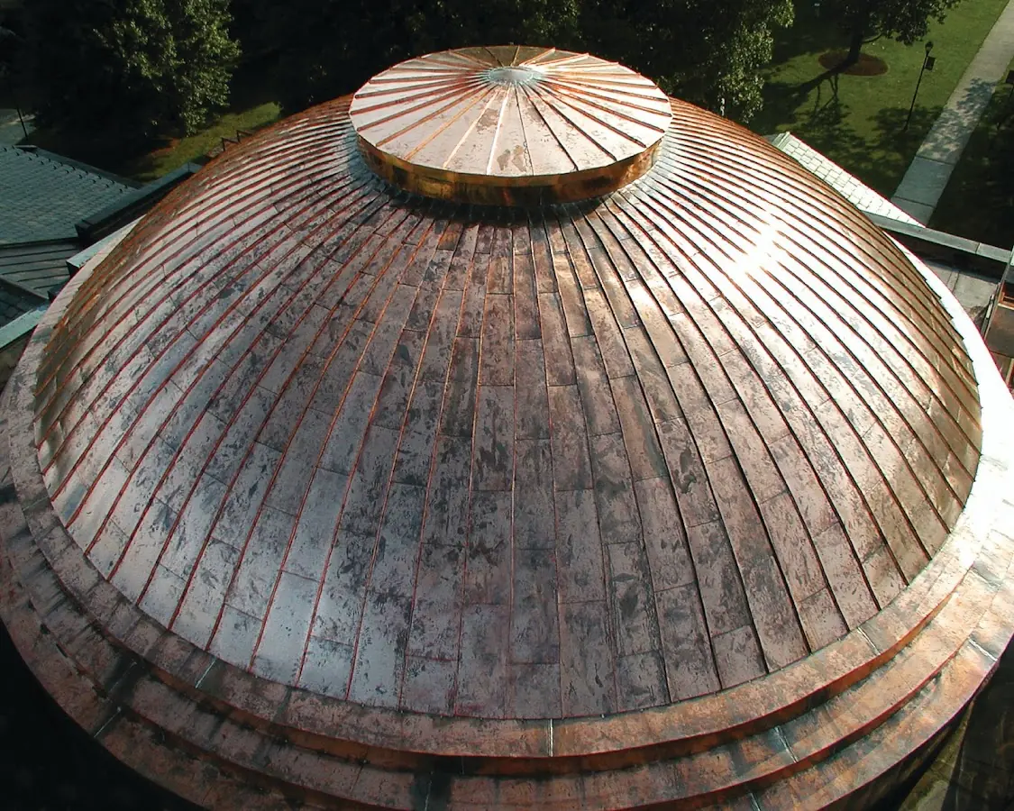 Craftsman Roofing crew installing a new roof in Raymore